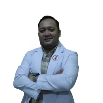 dr. Evan Wahyudy Ladala, Sp.B